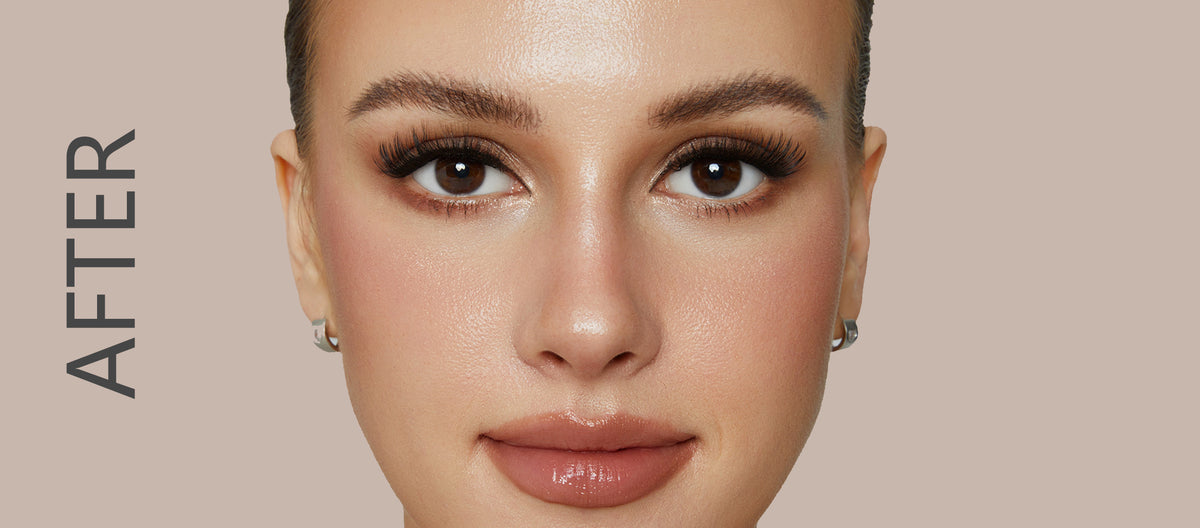 After view of a front-facing model wearing full, curled lashes.