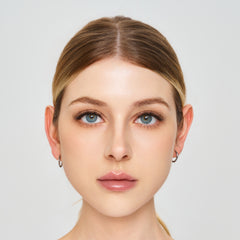 Front-facing beauty portrait showing the Moonlace lash look.