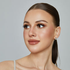 Model turned to one side to show The Mayfair lash look.